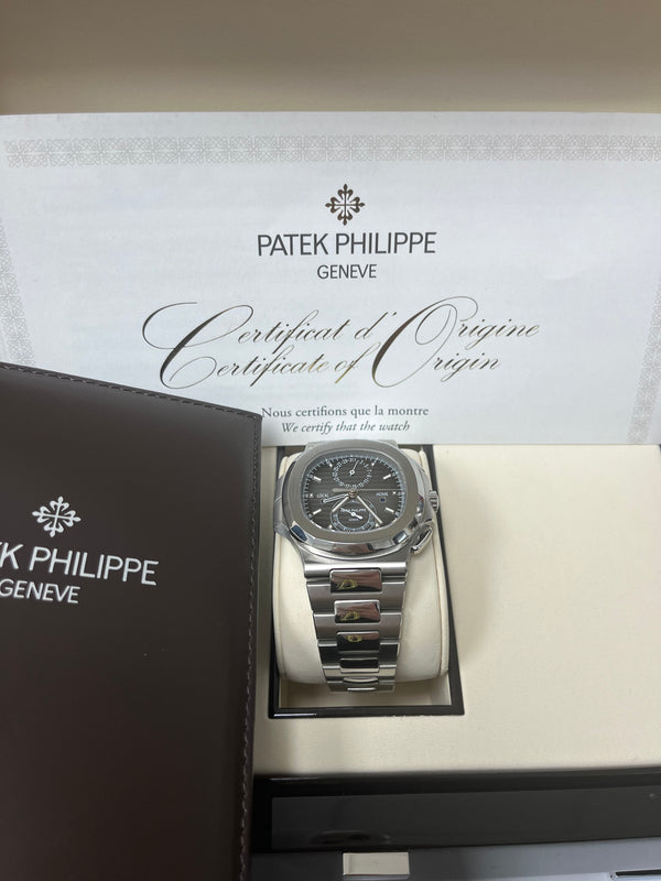 Patek Philippe Nautilus Travel Time Chronograph/ Stainless Steel/ Black Gradated Dial (Ref# 5990/1A-001)