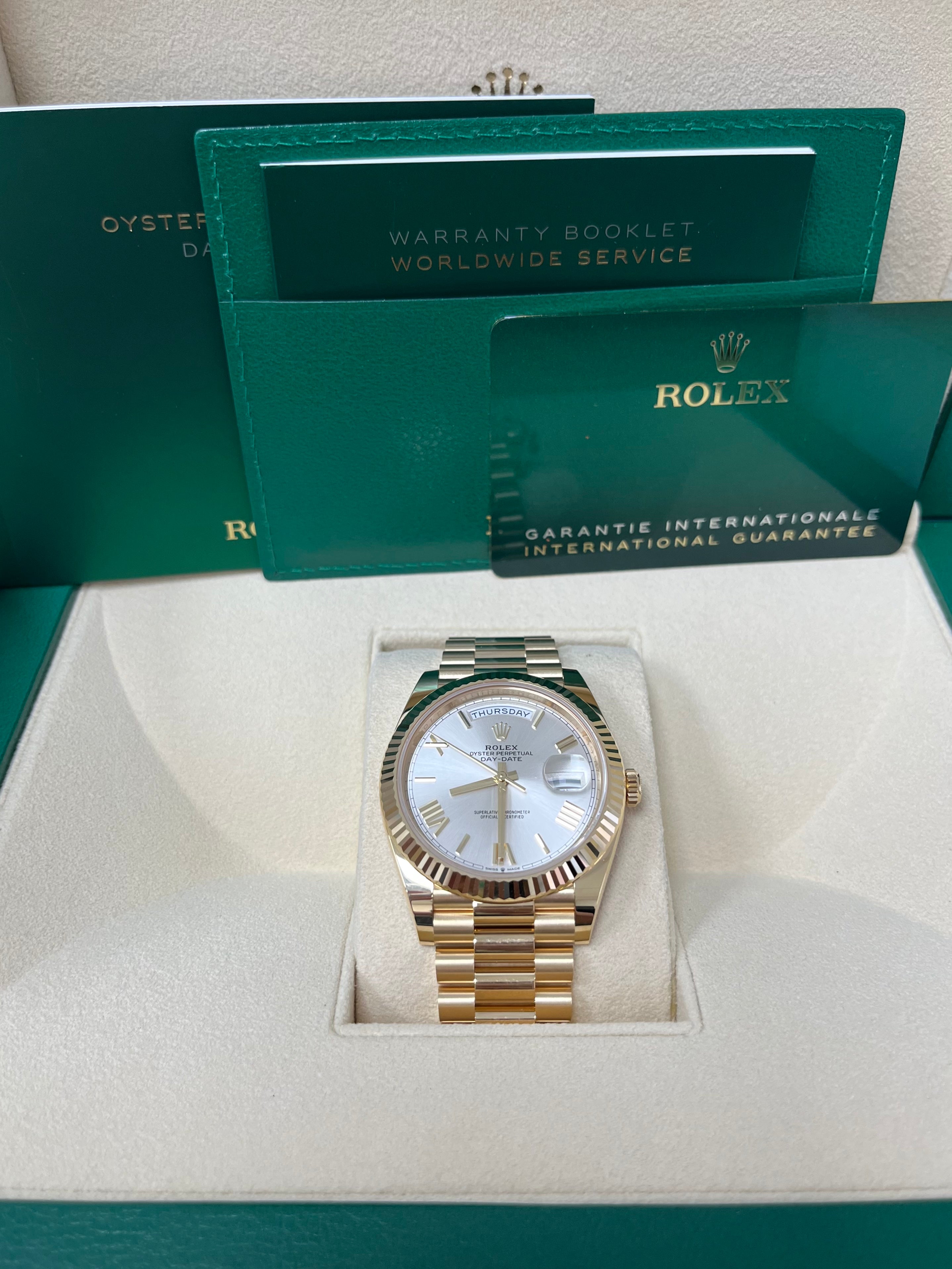 Rolex Day-Date 40 Yellow Gold Silver Roman Dial Fluted Bezel (Ref # 228238)