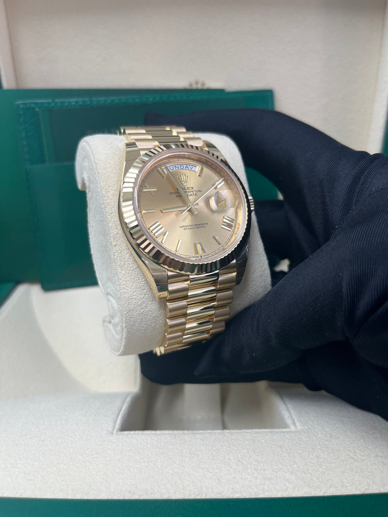 Rolex Day-Date 40 Yellow Gold Champagne Roman Dial Fluted Bezel (Ref # 228238)