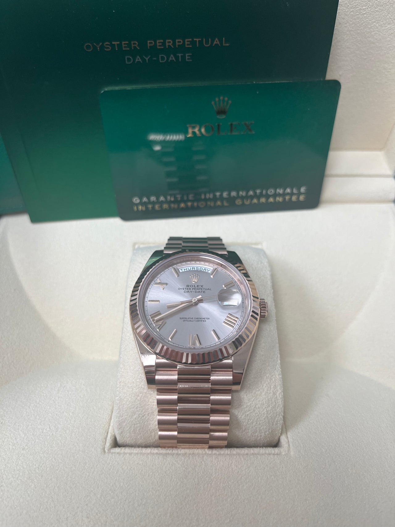 Rolex Day-Date 40 Rose Gold Sundust Roman Dial Fluted Bezel (Ref # 228235)