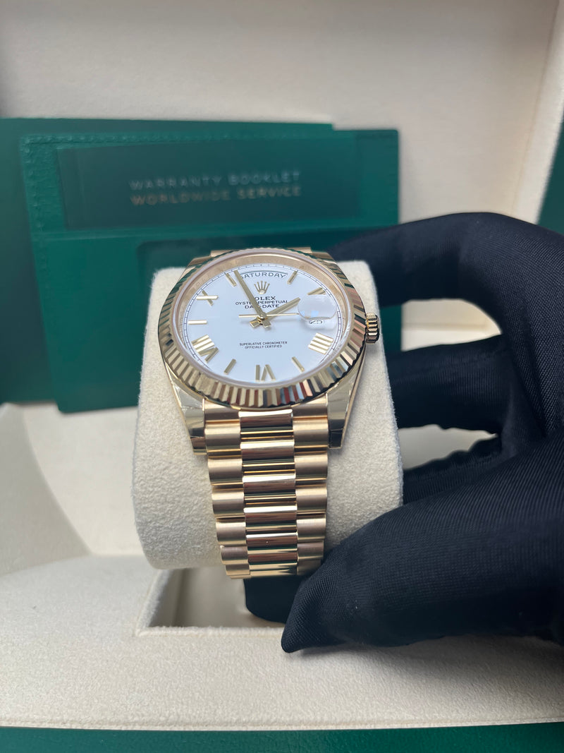 Rolex Day-Date 40 Yellow Gold White Roman Dial Fluted Bezel (Ref# 228238)