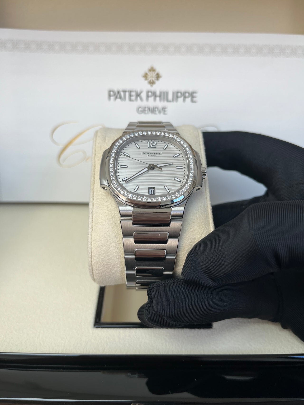 Patek Philippe Nautilus Diamond Bezel Silver Index Dial Reference #7118/1200A-010