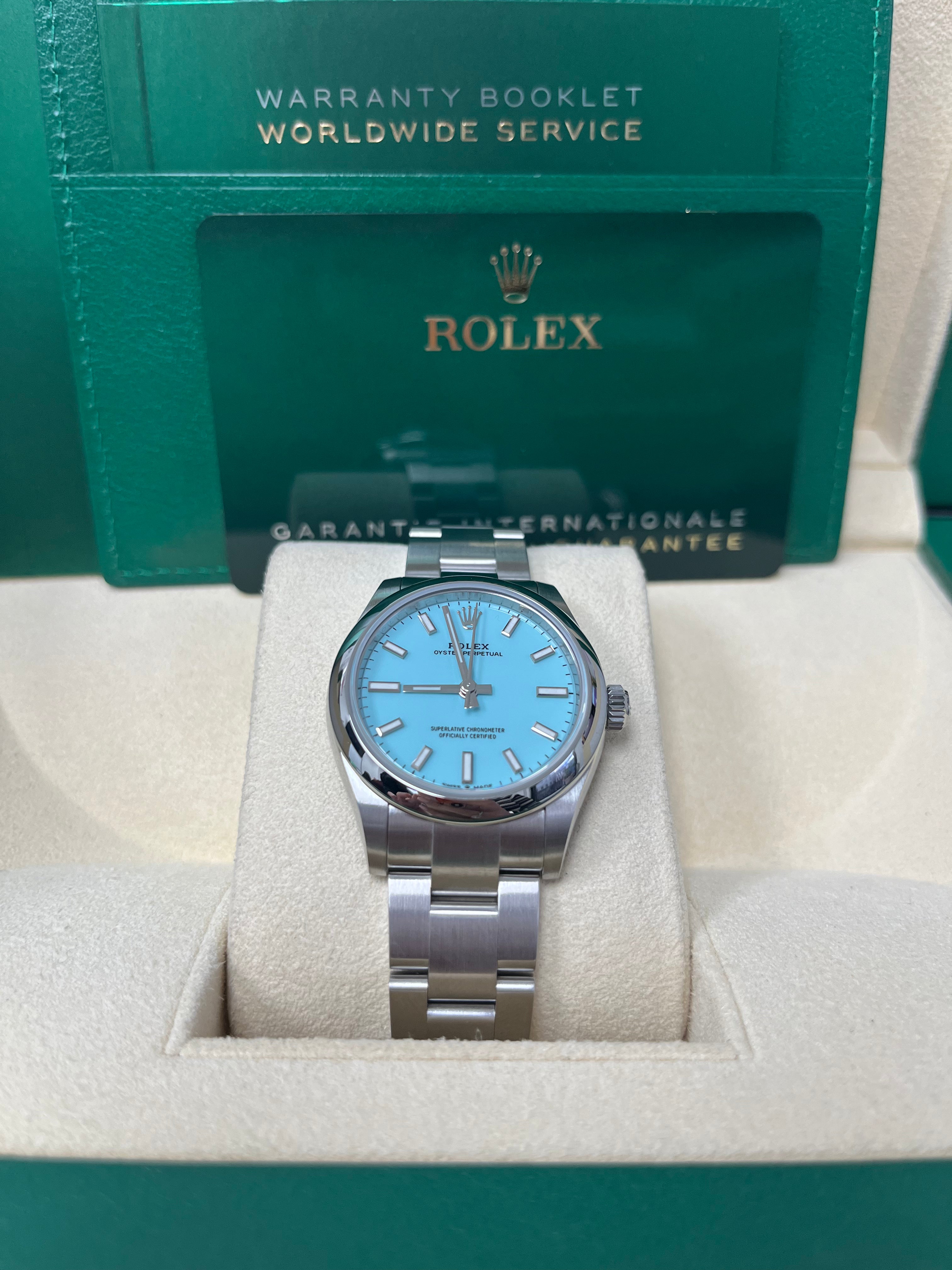 Rolex Oyster Perpetual 31 Domed Bezel Turquoise Blue Index Dial Oyster Bracelet 277200