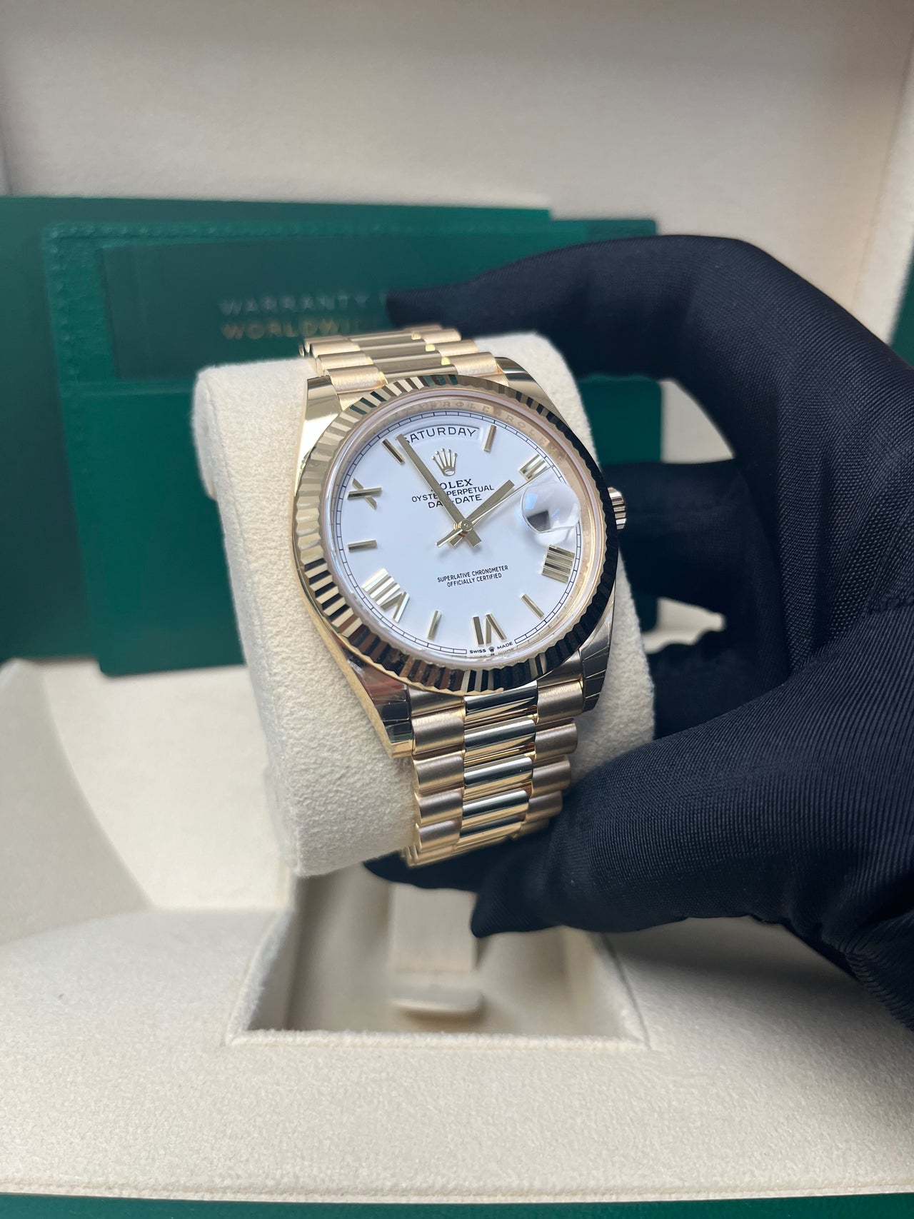 Rolex Day-Date 40 Yellow Gold White Roman Dial Fluted Bezel (Ref# 228238)