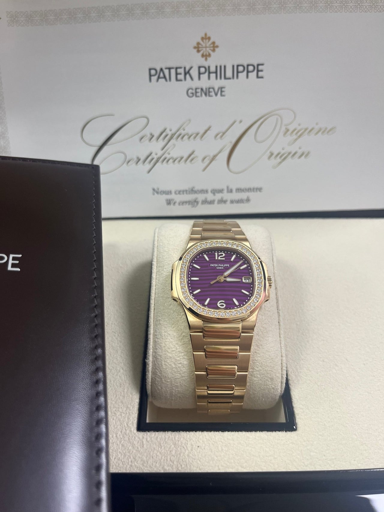 Patek Philippe Nautilus 32mm Diamond Bezel Rose Gold Purple Wave Dial 7010/1R-013 - WatchesOff5th