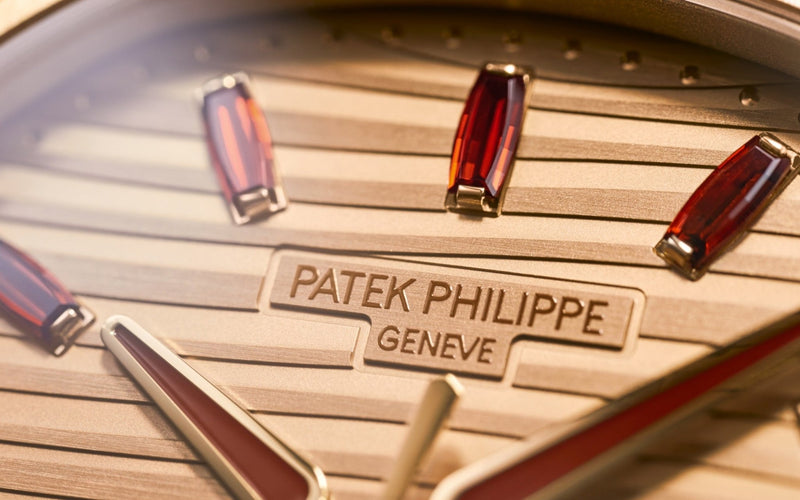 Patek Philippe Nautilus Automatic Rose Gold Baguette Cognac Bezel 7118/1300R-001 - WatchesOff5thWatch