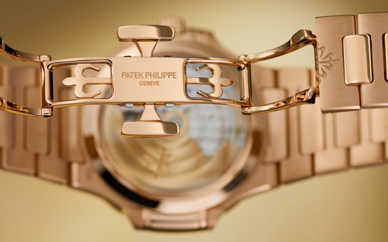 Patek Philippe Nautilus Automatic Rose Gold Baguette Cognac Bezel 7118/1300R-001 - WatchesOff5thWatch