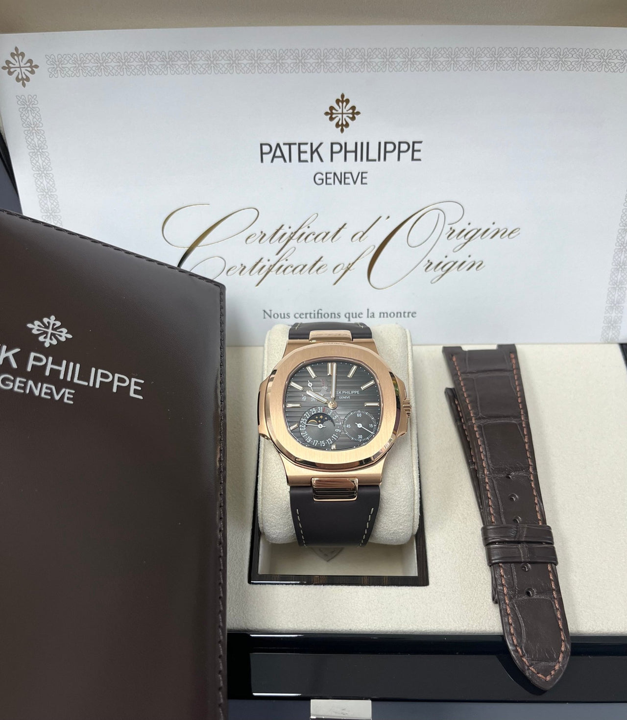 Patek Philippe Nautilus Black Dial Ref #5712R-001 - WatchesOff5thWatch