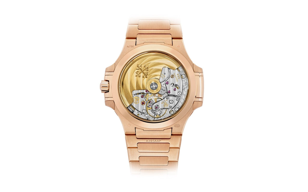 Patek Philippe Nautilus Ladies Rose Gold Nautilus White Dial Diamond Bezel 7118/1200R-001 - WatchesOff5thWatch