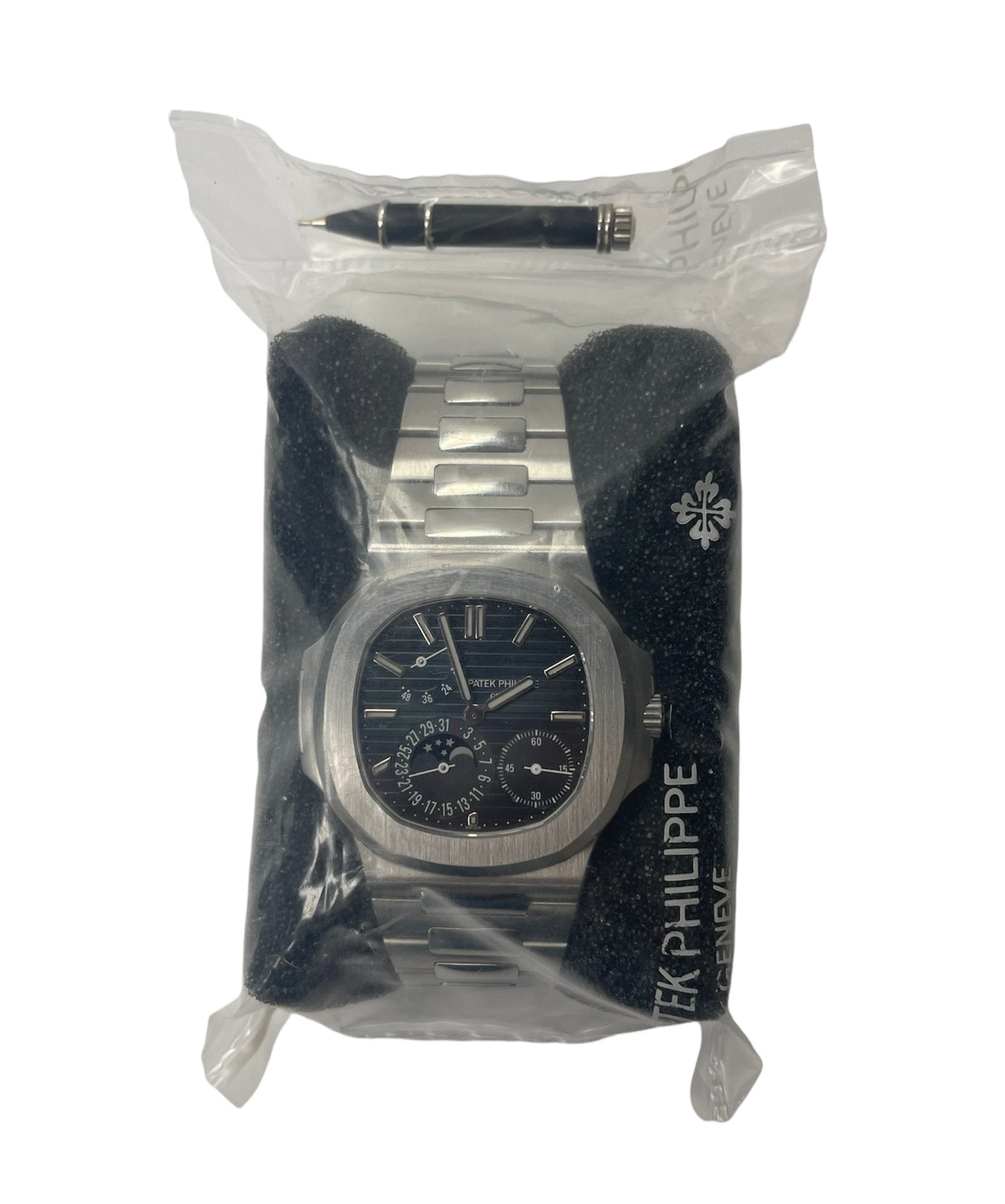 Patek Philippe Nautilus Moon Phase Stainless Steel/ Blue Date Dial (Ref#5712/1A-001) Sealed - WatchesOff5thWatch