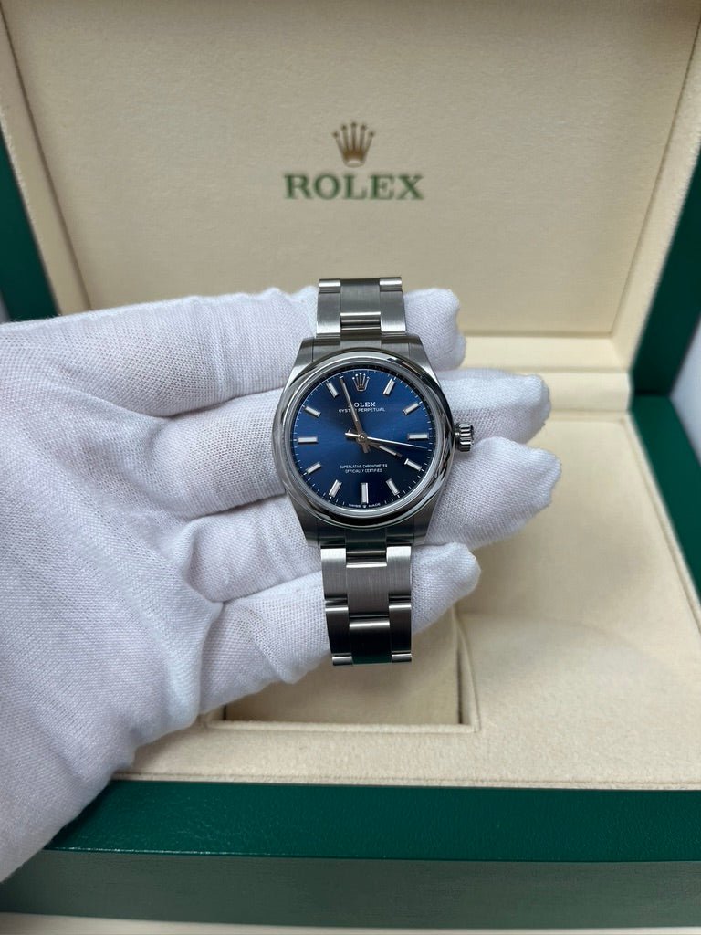Rolex Oyster Perpetual 31 Domed Bezel Blue Index Dial Oyster Bracelet (Ref# 277200) - WatchesOff5th