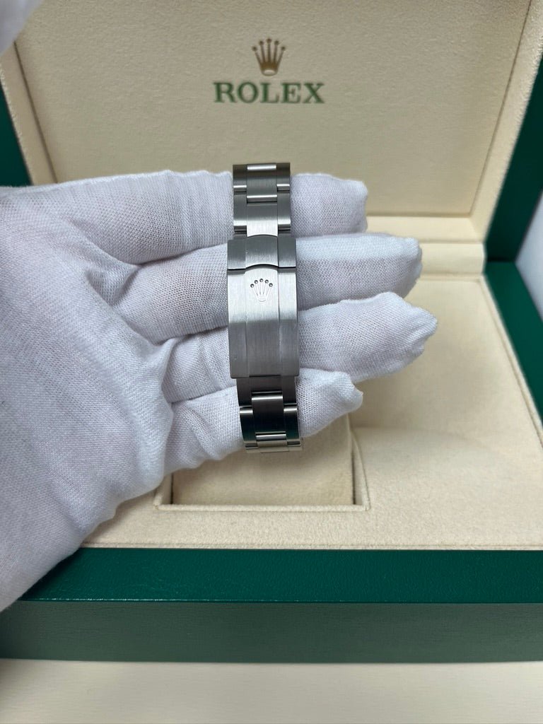 Rolex Oyster Perpetual 31 Domed Bezel Blue Index Dial Oyster Bracelet (Ref# 277200) - WatchesOff5th