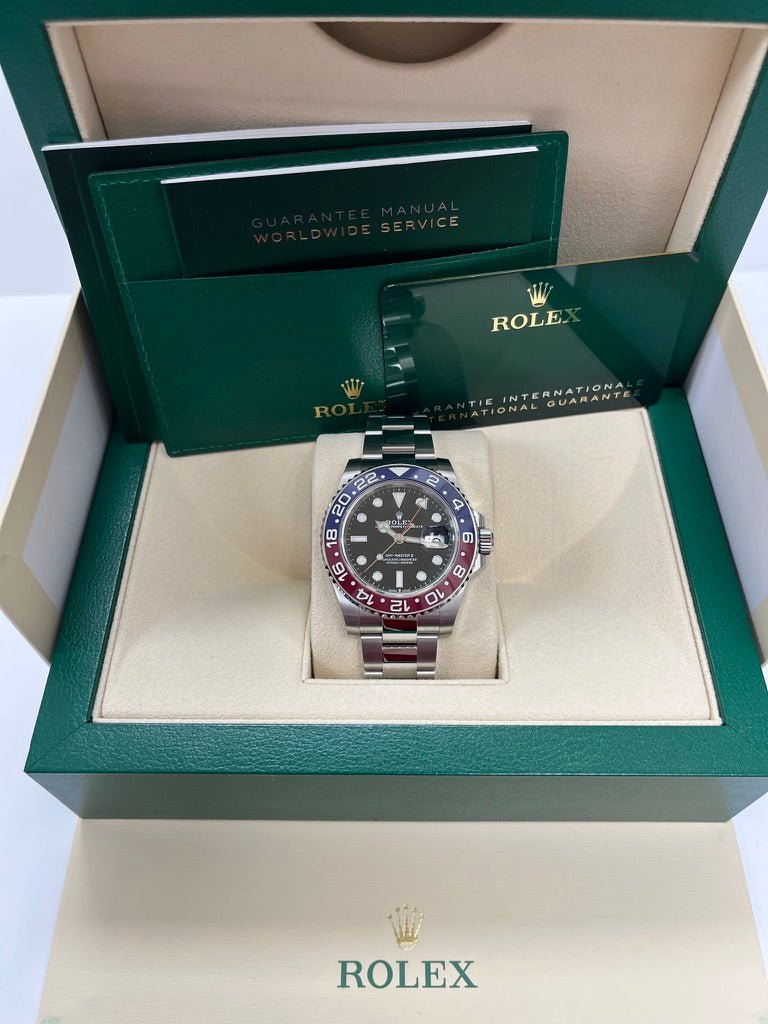 Rolex Steel GMT-Master II 40 Watch - Blue And Red Pepsi Bezel - Black Dial - Oyster Bracelet (Ref# 126710BLRO) - WatchesOff5thWatch