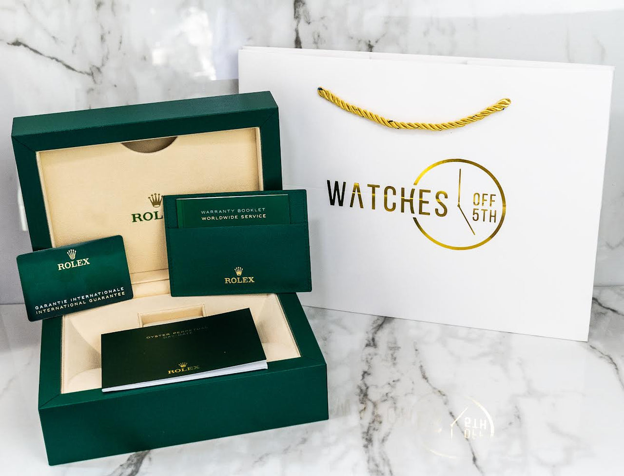 Rolex Yellow Gold Day-Date 40 Watch - Yellow Gold Bezel - Champagne Baguette Diamond Dial - President Bracelet ( Ref# 228348RBR) - WatchesOff5thwatch